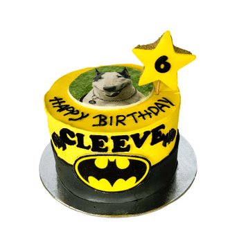 Batman dog birthday cake featuring a personalized photo and fun decorations for a paw-some dog party.