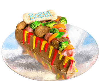 Pupperoni pizza dog cake topped with veggies and a bone cookie for a pet celebration, perfect for your pup's birthday!
