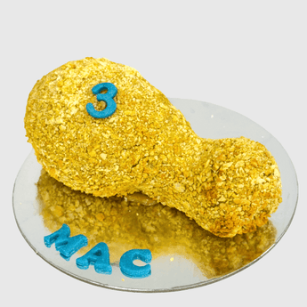 Dog birthday cake chicken drumstick shaped like a drumstick for your pup’s special day.