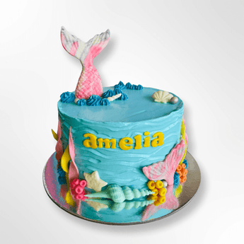 Under the Sea - Dog Cake featuring a mermaid tail design and colorful decorations for a dog birthday cake.