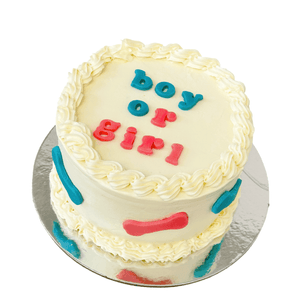 Delicious 5" gender reveal dog cake with blue and pink decorations for your pup's Dog Party.
