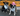 Two dogs wearing cowboy cowgirl pet hats for a fun dog party, adding flair and style to the gathering.