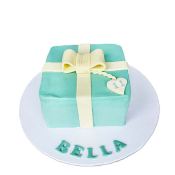 Tiffany Box dog cake designed as a delightful turquoise gift box with a ribbon for a dog's birthday.