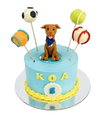 5" Dog and Ball Cake featuring a playful dog figurine and colorful ball decorations for a fun dog party.