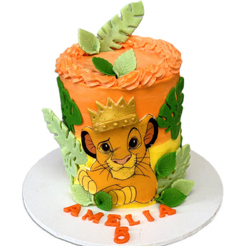 Lion King dog birthday cake decorated with colorful layers and Simba design, perfect for a fun dog birthday party.