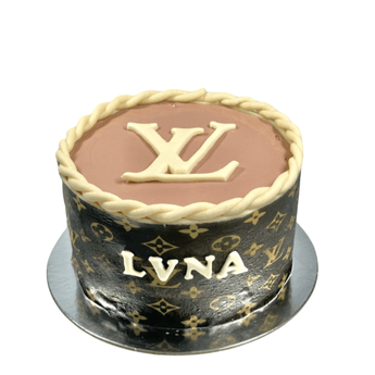 Dog Birthday Cake featuring a stylish louis vuitton themed dog cake with elegant design and flavors.